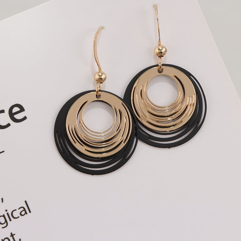 Unique Copper Hoop Earrings with Spiral Pattern