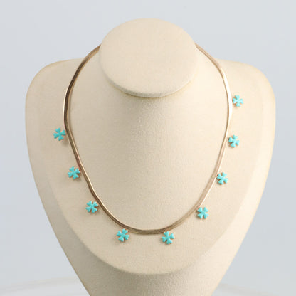 Elegant Blue Four-Leaf Clover Necklace with Modern Design