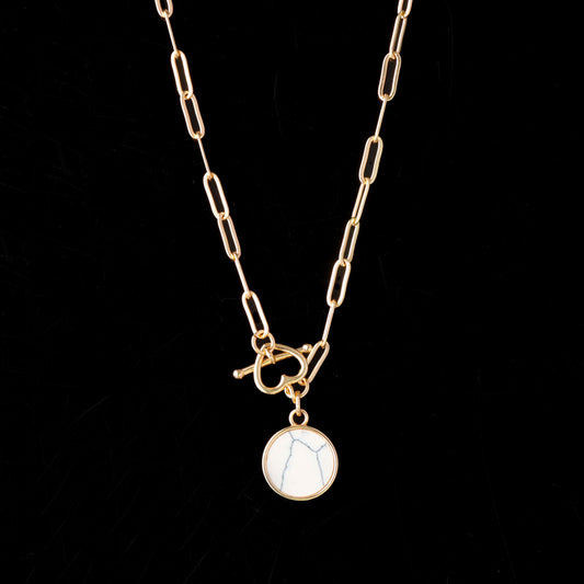 Cross Chain Necklace with Geometric Circular Pendant