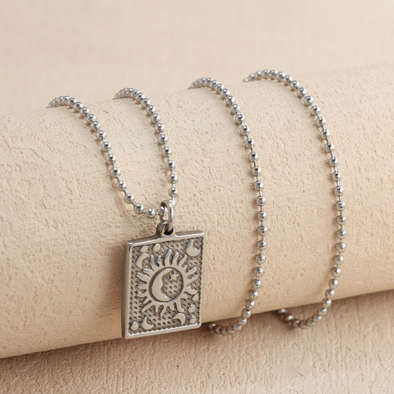 Buddha bead chain with square pendant of sun and moon