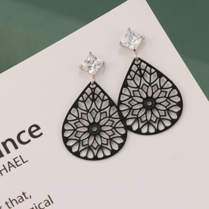 Ethnic Black Floral Drop Earrings - Symmetrical and Asymmetrical Design