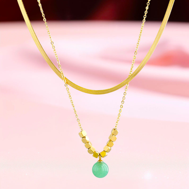 Multi-layered Serpentine Bone Necklace with Natural Stone Pendant