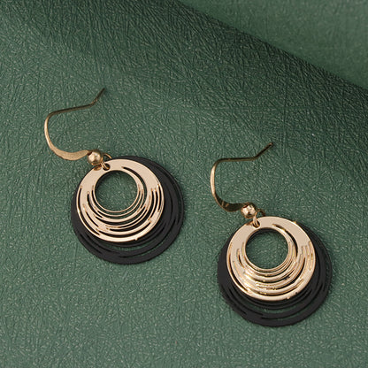 Unique Copper Hoop Earrings with Spiral Pattern