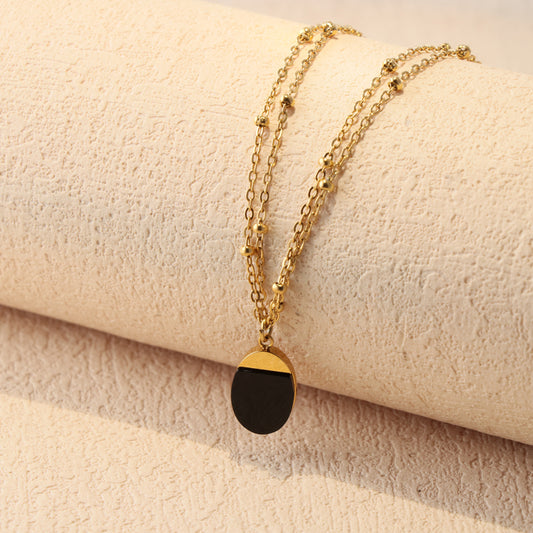 Gold Stainless Steel O-Chain Necklace with Black Beaded Pendant