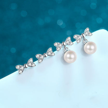 925 Sterling Silver Heart Bow Stud Earrings - 0.30ct Moissanite & 6mm Freshwater Pearls