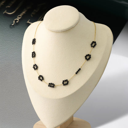 Sophisticated O-Chain Necklace with Black Floral Pendant
