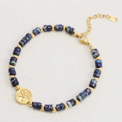 Blue Lapis Lazuli Beaded Bracelet - Gold Accented Stainless Steel Statement Jewelry