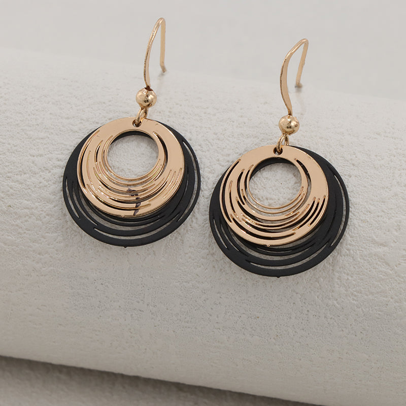 Unique Copper Hoop Earrings with Spiral Pattern