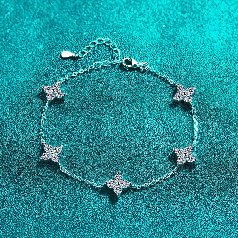 Minimalist Nature-Inspired Rhodium Plated Sterling Silver Bracelet - 2ct Moissanite with Shell & Starburst Design