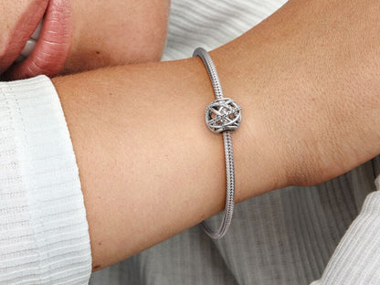 Radiant Silver Starburst Charm