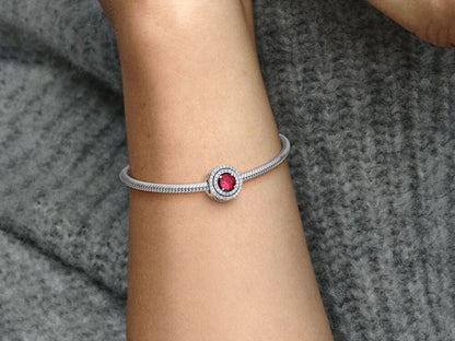 Red Sparkling Leveled Round Charm