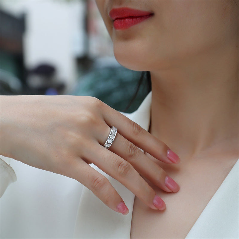Polished Silver Ring with Round Moissanite Stone