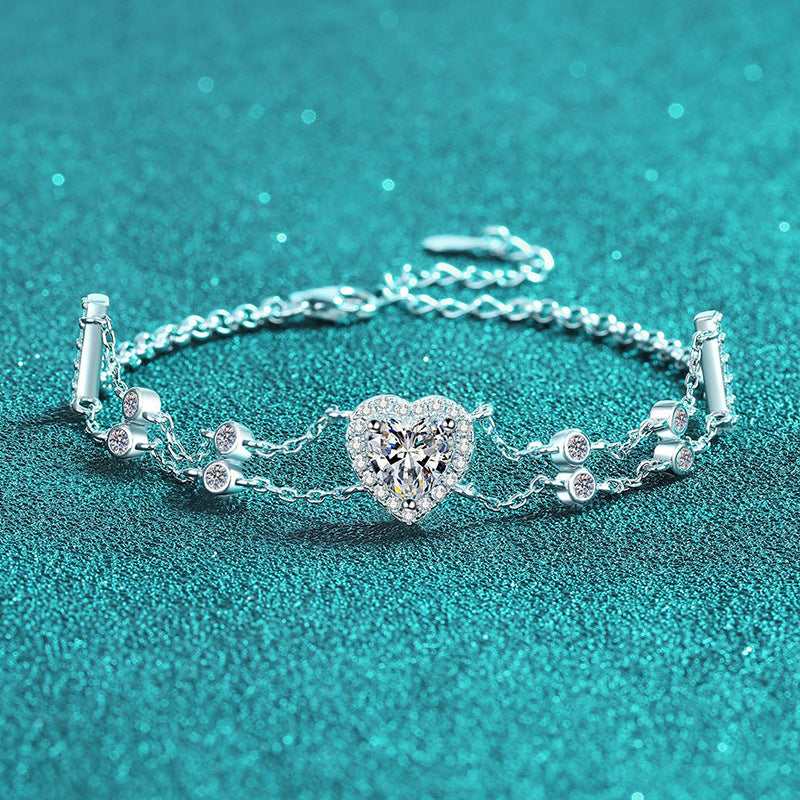 Princess Celestial Bracelet: Choose 1ct Moissanite, 1ct Blue Moissanite, or 6.5mm Heart Zircon. Set in rhodium-plated sterling silver.
