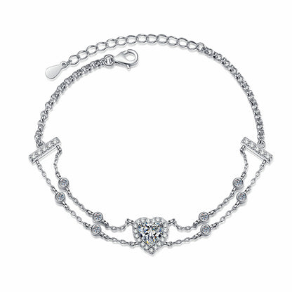 Princess Celestial Bracelet: Choose 1ct Moissanite, 1ct Blue Moissanite, or 6.5mm Heart Zircon. Set in rhodium-plated sterling silver.